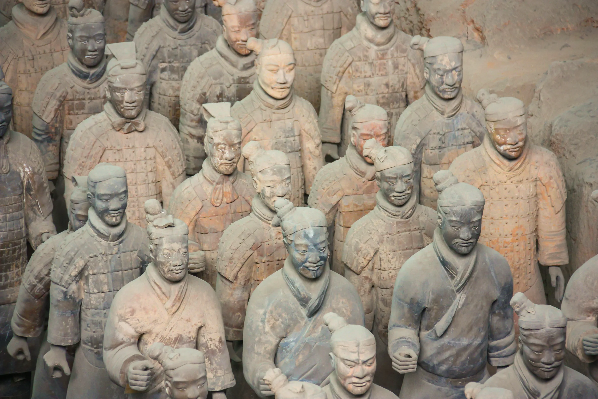 Excavated trench with clay figures in formation